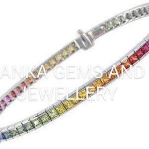 Bracelet with Sapphires arranged in a Rainbow theme set in 10k White Gold