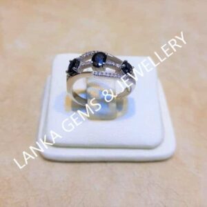 Ring with Blue Sapphire and Diamond set in 9k White Gold